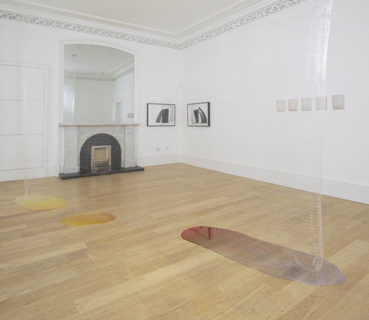 Installation view of 'Slow Objects' at the Common Guild, Glasgow, showing Erin Shirreff's Signatures (1) (2011), Edith Dekyndt's Slow Object 02 (1997/2016), and Vanessa Billy's Les fons qui plerent (2017).
