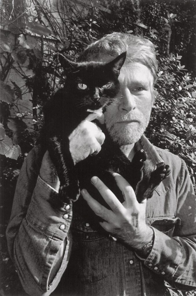 R.B. Kitaj photographed in London with his cat by Lee Friedlander.