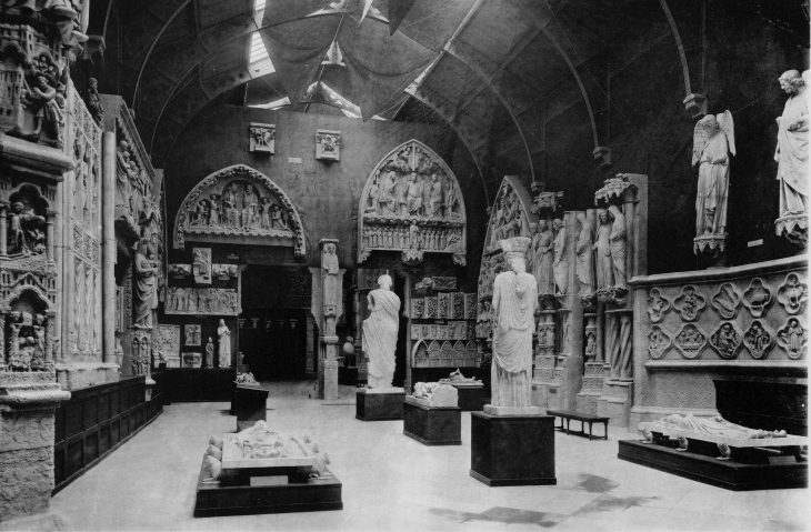 The Erechtheion caryatid, purchased from the British Museum and displayed in the 12th-century gallery of the Trocadéro, adjacent to the smiling angel from Reims Cathedral. From P. F. J. Marcou, Album du Musée de Sculpture Comparée, vol. 2 (Paris, 1897), courtesy Princeton University Press