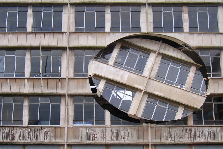 Turning The Place Over (2007), Richard Wilson. The work was built into the condemned Cross Keys House in Moorfields as part of the Capital of Culture for 2008, in June 2007 in Liverpool, England.