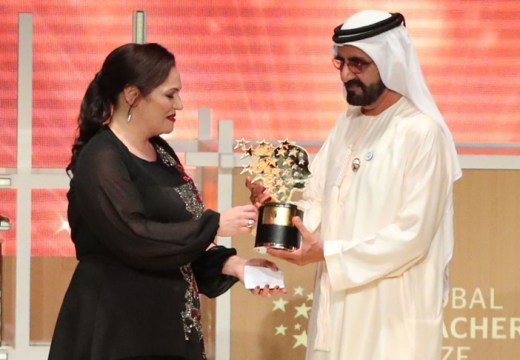 Andria Zafirakou receives the 'Global Teacher Prize' from Sheikh Mohammed bin Rashid al-Maktoum, Vice-President and Prime Minister of the UAE and Ruler of Dubai during an award ceremony in Dubai on 18 March 2018.
