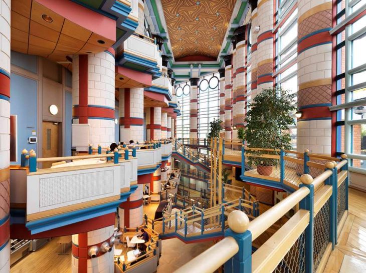 Inside the Judge Business School, Cambridge, designed by John Outram, which has received a Grade II* listing. © Historic England