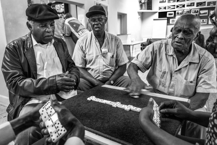 Dominoes being played by first generation migrants in a club in Clapham