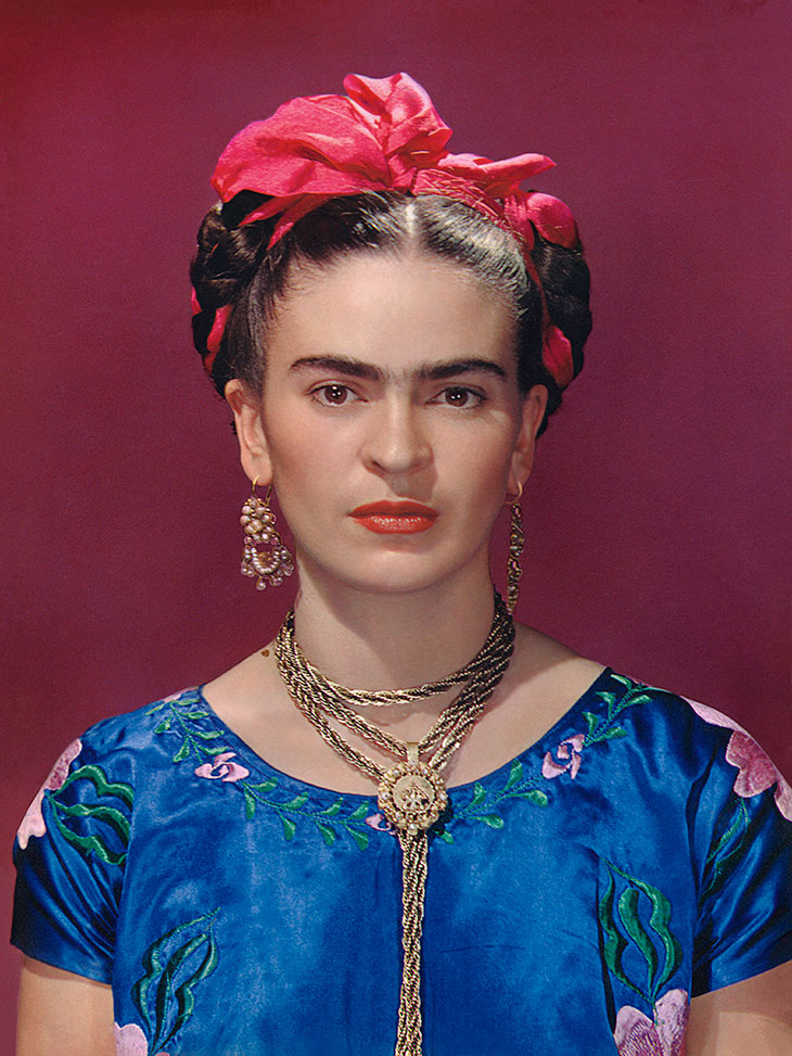 Frida Kahlo in blue satin blouse, Nickolas Muray