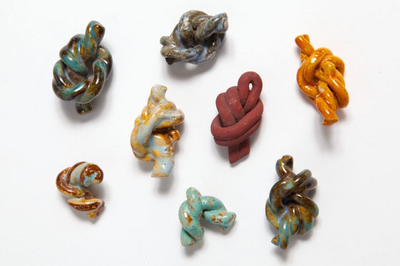 A group of 8 twisted rope shaped buttons, some stoneware, some earthenware (1945–49), Lucie Rie
