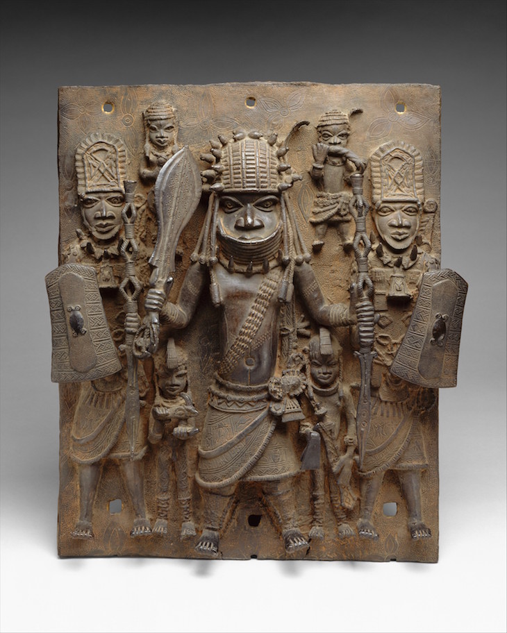Plaque depicting warrior and attendants (16th–17th century), Edo peoples, Benin kingdom, Nigeria. 