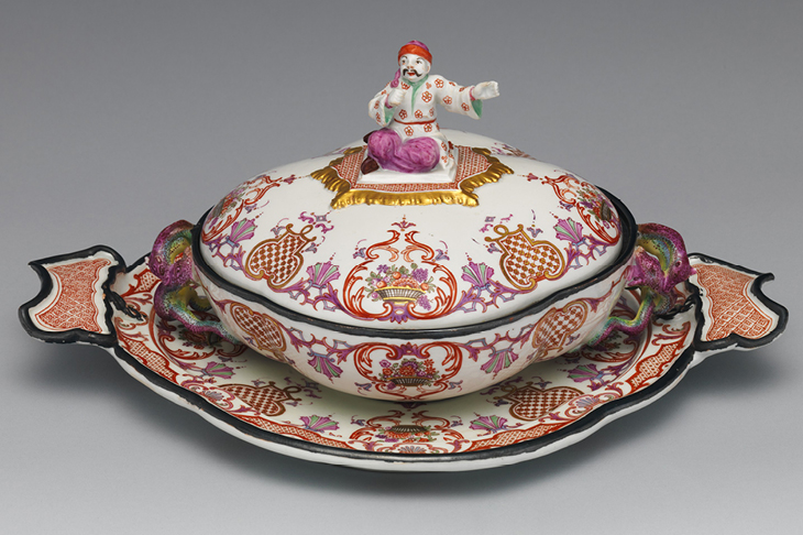 Tureen and cover with a seated Oriental as a knob, and snake handles