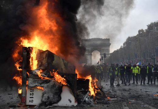 A burnt-out truck on the Champs Elysees in Paris, BERTRAND GUAY/AFP/Getty Images