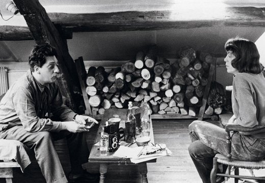 Jean-Paul Riopelle and Joan Mitchell photographed in their apartment-studio on Rue Frémicourt, Paris in 1963.