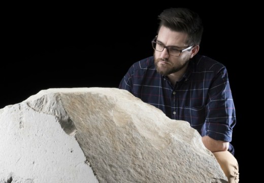 Daniel Potter, assistant curator at National Museum of Scotland, with a casing stone from the Great Pyramid of Giza.
