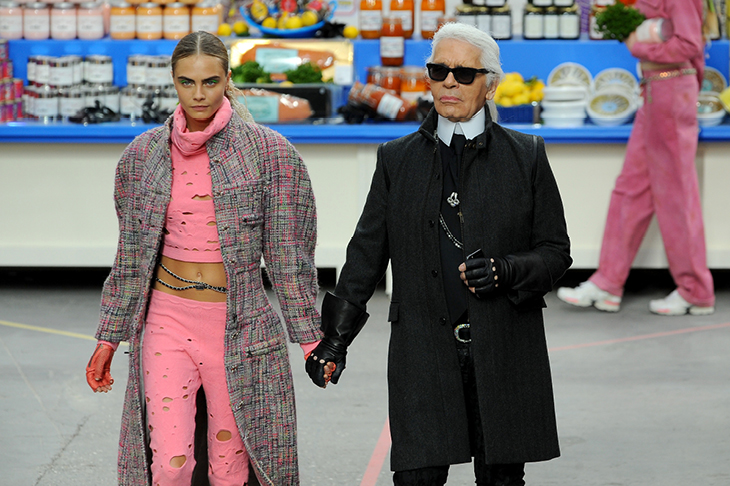 Karl Lagerfeld with Cara Delevingne during the Chanel show at Paris Fashion Week, 2014.