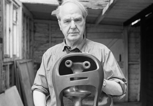 Portrait of Henry Moore with Helmet Head No. 2 (1950) in 1967.