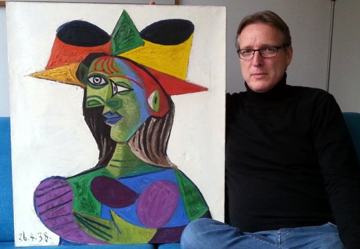 Arthur Brand with the recovered Buste de Femme (1938) by Picasso.