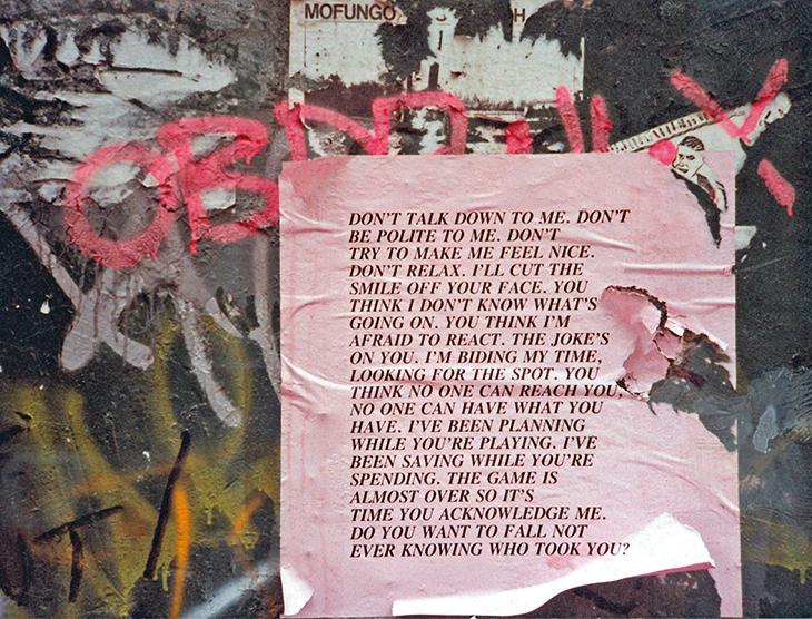 Untitled (Don’t Talk Down to Me) from Inflammatory Essays (1979–82), Jenny Holzer, photograph documenting the project in New York in 1983.