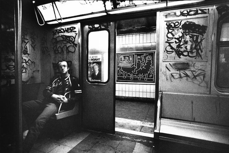 Keith Haring in Subway Car (c. 1984), Tseng Kwong Chi.
