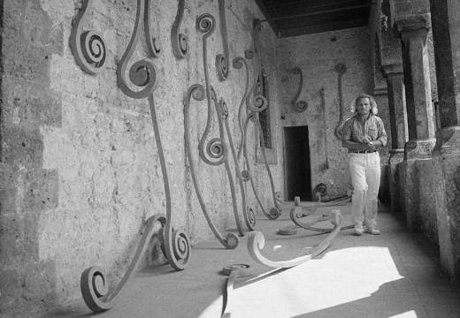 Eliseo Mattiacci with an installation of his Roma sculptures at the Palazzo Mazzancolli, Italy, in 1982.
