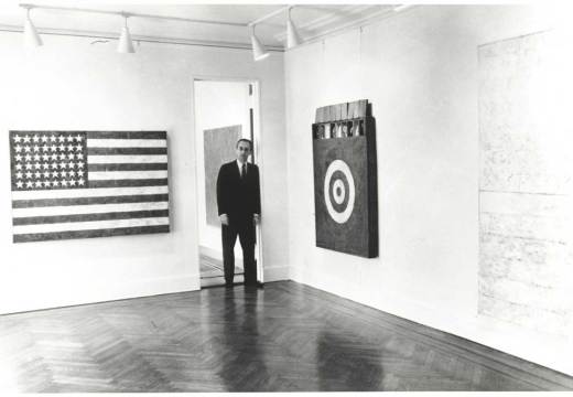 Leo Castelli in a room of the Jasper Johns exhibit at the Castelli Gallery, New York, 1958. Archives of American Art, Smithsonian Institution