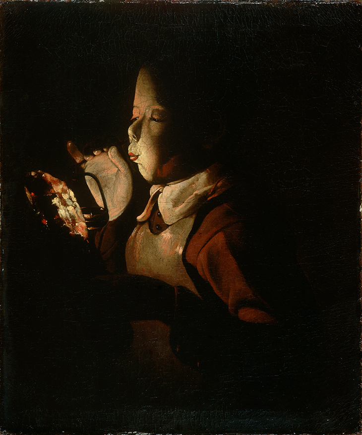Boy Blowing on Firebrand (c. 1660), Georges de la Tour.