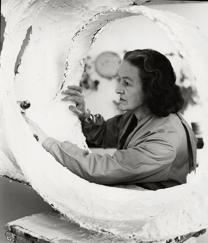 Barbara Hepworth working on the plaster Oval Form (Trezion) at the Palais de Danse in 1963.