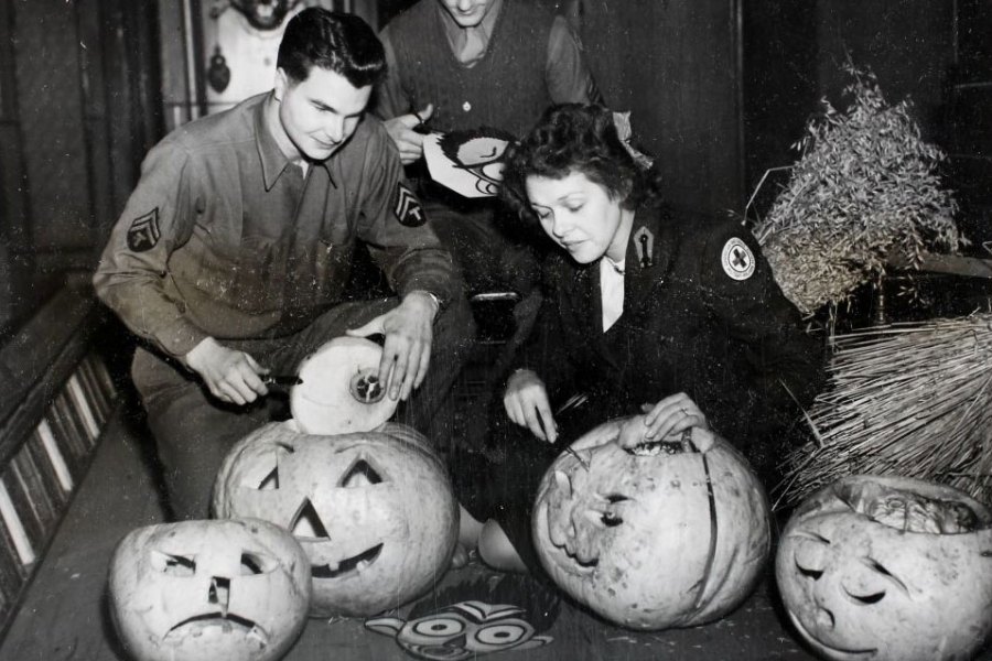 American Red Cross workers hollowing out pumpkins in preparation for a Halloween Dance at Cheltenham Town Hall in 1944.