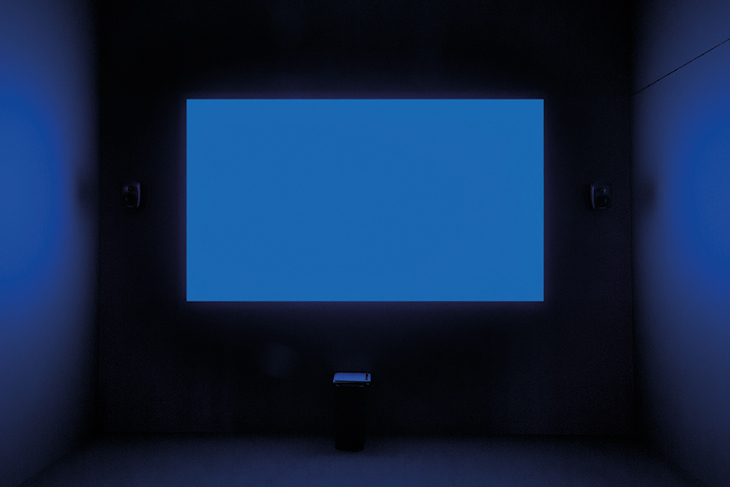 Installation view of Derek Jarman’s ‘Blue’ (1993), first shown at the Venice Biennale in June 1993. Courtesy Tate; © Basilisk Communications