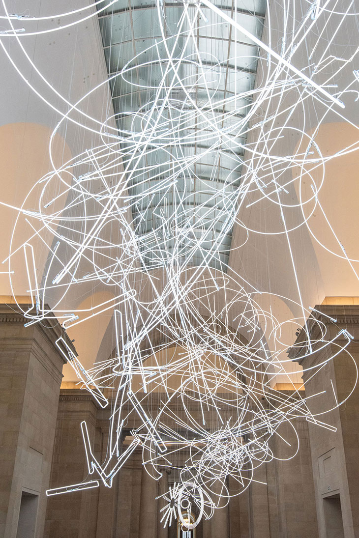 Installation view of Cerith Wyn Evans’s Forms in Space…by Light (in Time), commissioned by and first shown at Tate Britain, London, in 2017.