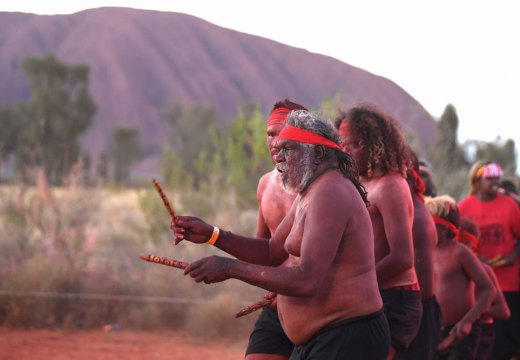 Anangu members perform a dance during a ceremony marking the permanent ban on climbing Uluru on 27 October 2019.