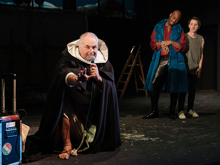 Howard Ward as Girolamo Savonarola, Stefan Adegbola as Poggio di Chiusi, and Dickie Beau as Sandro Botticelli in Botticelli in the Fire at Hampstead Theatre, London, 2019.