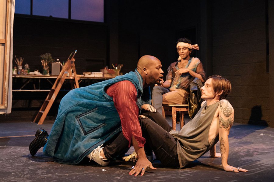 Stefan Adegbola as Poggio di Chiusi, Hiran Abeysekera as Leonardo da Vinci, and Dickie Beau as Sandro Botticelli in Botticelli in the Fire at Hampstead Theatre, London, 2019.