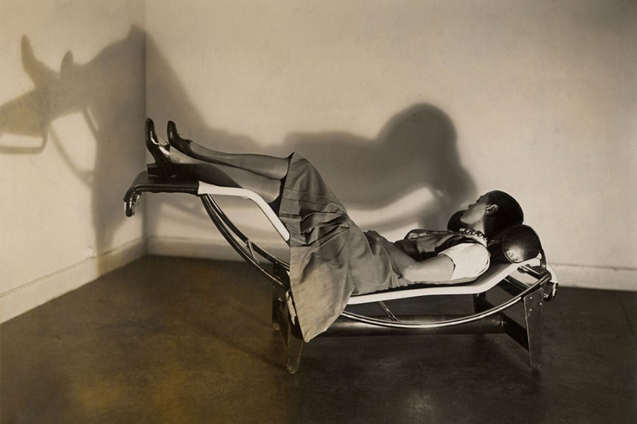 Charlotte Perriand on the ‘chaise longue basculante, B306’ designed by Perriand, Pierre Jeanneret and Le Corbusier in c. 1928.