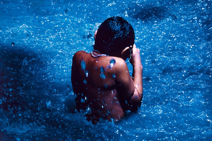 The young Susi Korihana Theri swimming, infrared film, Catrimani, Roraima (1972–74), Claudia Andujar.