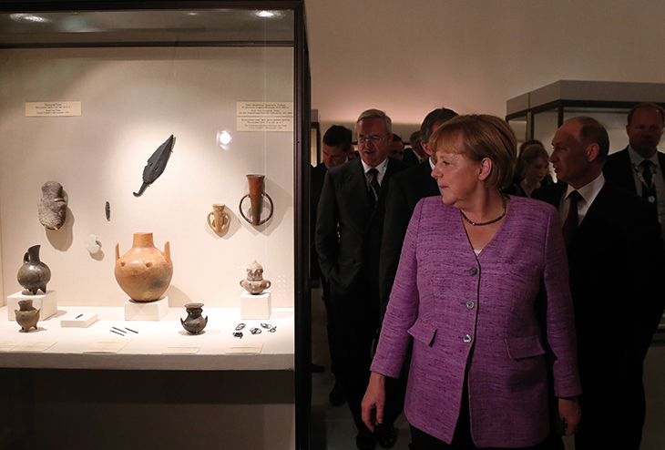 Angela Merkel and Vladimir Putin visiting ‘The Bronze Age of Europe: Europe Without Borders’ at the State Hermitage Museum in St Petersburg in June 2013.