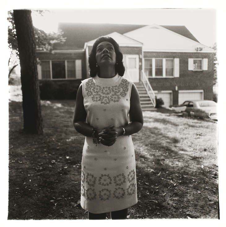 Mrs. Martin Luther King, Jr. on her front lawn, Atlanta, Ga., 1968 (1968), Diane Arbus.