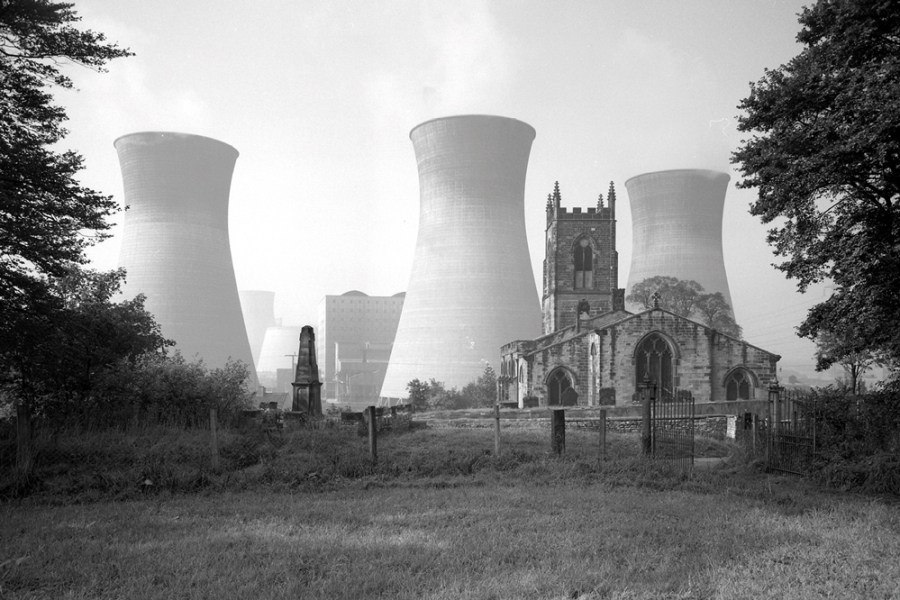 View of Ferrybridge B power station behind the Church of St Edward the Confessor in Brotherton, North Yorkshire, photographed by Eric de Maré in 1960. Photo: © Eric de Maré/RIBA collections