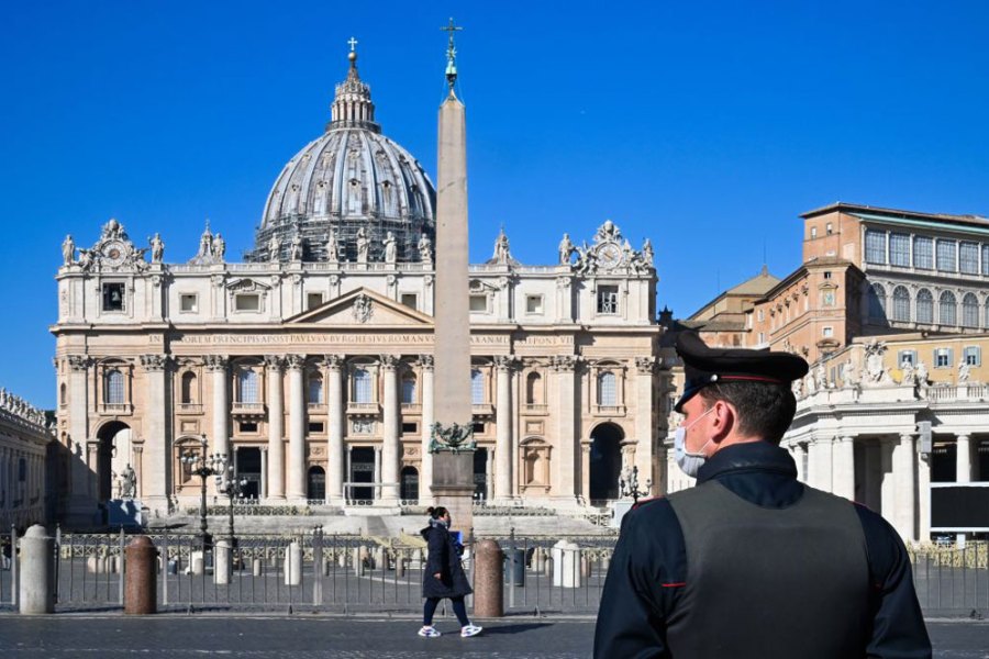 A police officer standing guard in St Peter’s Square.