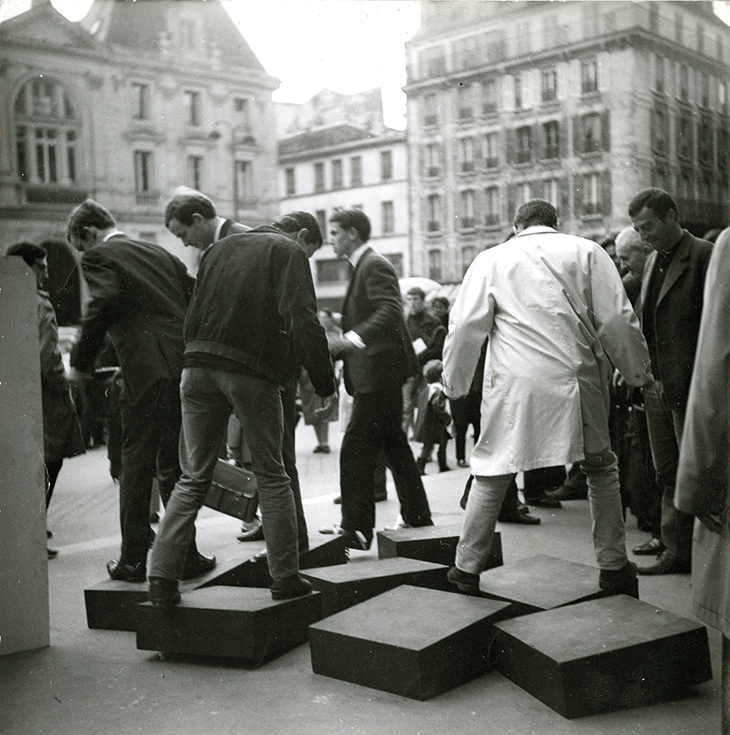 Photograph documenting Une journée dans la rue: dalles mobiles (A Day in the Street: moveable tiles ), Montparnasse, Paris, 19 April 1966