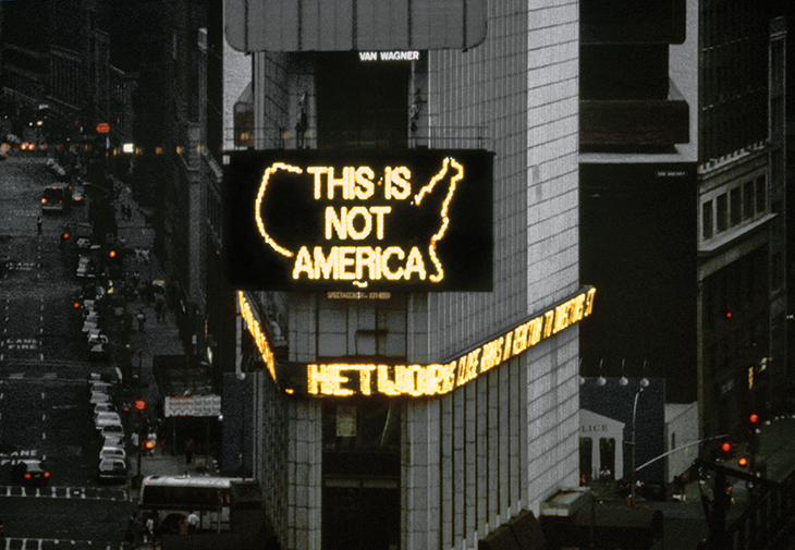 Still from a video documenting ‘A Logo for America’ (1987) by Alfredo Jaar in Times Square, New York. 