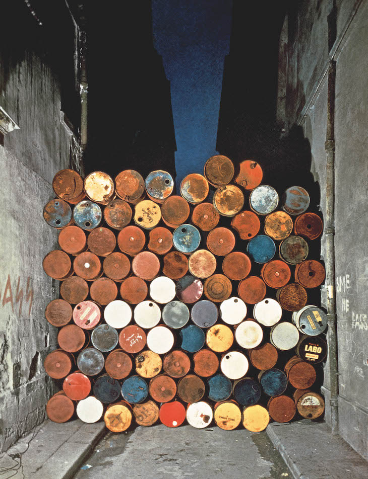 Temporary Wall of Oil Barrels – The Iron Curtain, Rue Visconti, Paris, 27 June 1962 (1962), Christo and Jeanne-Claude.