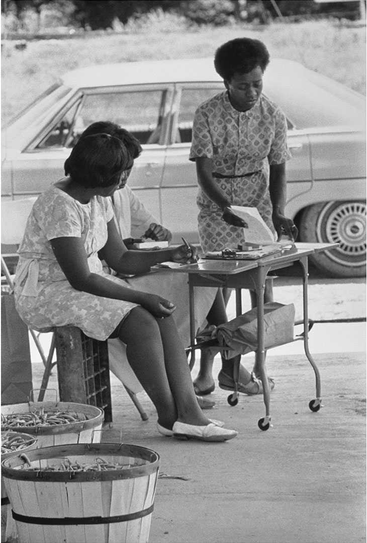 L.C. Dorsey, a Civil Rights worker, at the North Bolivar County Farm Vegetable Cooperative, Mississippi (1968), Doris Derby.