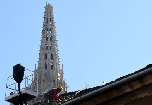 A builder works on the roof of the south tower of Zagreb's cathedral in April 2020 following the 5.3-magnitude earthquake in downtown Zagreb on 22 March. Photo: DENIS LOVROVIC/AFP via Getty Images