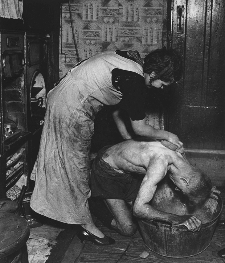 Coal-Miner’s Bath, Chester-le-Street, Durham (1937), Bill Brandt.