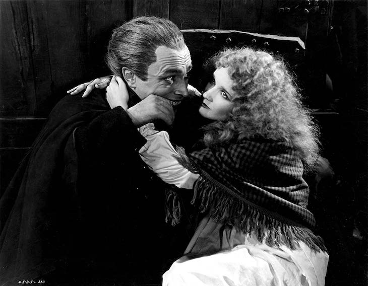 Mary Philbin and Conrad Veidt in The Man Who Laughs (1928)