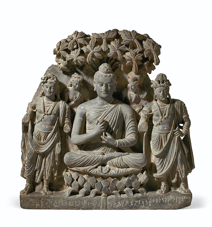 Grey schist relief triad of Buddha Shakyamuni with bodhisattvas (c. 3rd–4th century), Gandhara. Christie’s New York ($600,000–$800,000)