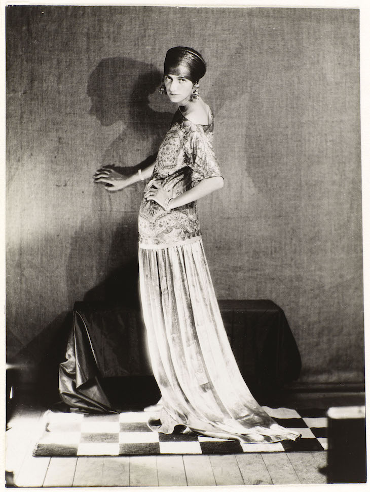 Peggy Guggenheim in a dress by Poiret (1924), Man Ray.