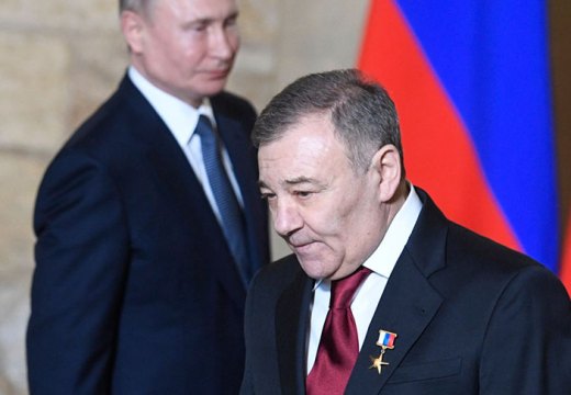 Arkady Rotenberg, who together with his brother Boris Rotenberg has been accused by a US Senate report of evading sanctions by buying art at auction in New York, at an awards ceremony with President Putin in Russia in March 2020.
