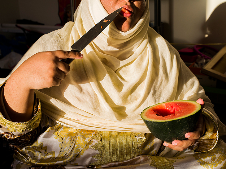 S Eating Watermelon (2016) from the Arrival series, Farah Al Qasimi. Courtesy the artist and The Third Line, Dubai; © Farah Al Qasimi