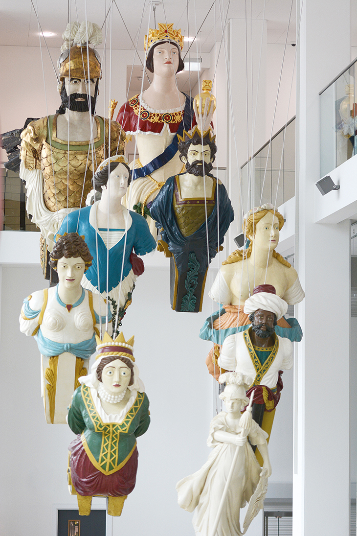 A collection of 19th-century naval figureheads, installed in the entrance hall at the Box, Plymouth.