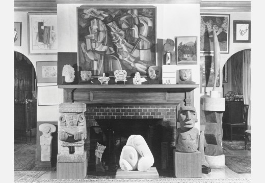 Photograph taken by Floyd Faxon in c. January 1951 of the living room, with views into the dining room through the north and south archways, of 7065 Hillside Avenue.