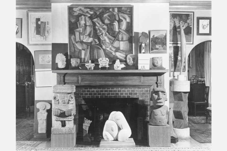 Photograph taken by Floyd Faxon in c. January 1951 of the living room, with views into the dining room through the north and south archways, of 7065 Hillside Avenue.