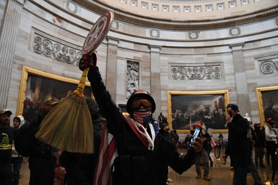 Selfie harm: rioters in the US Capitol rotunda on January 2021.
